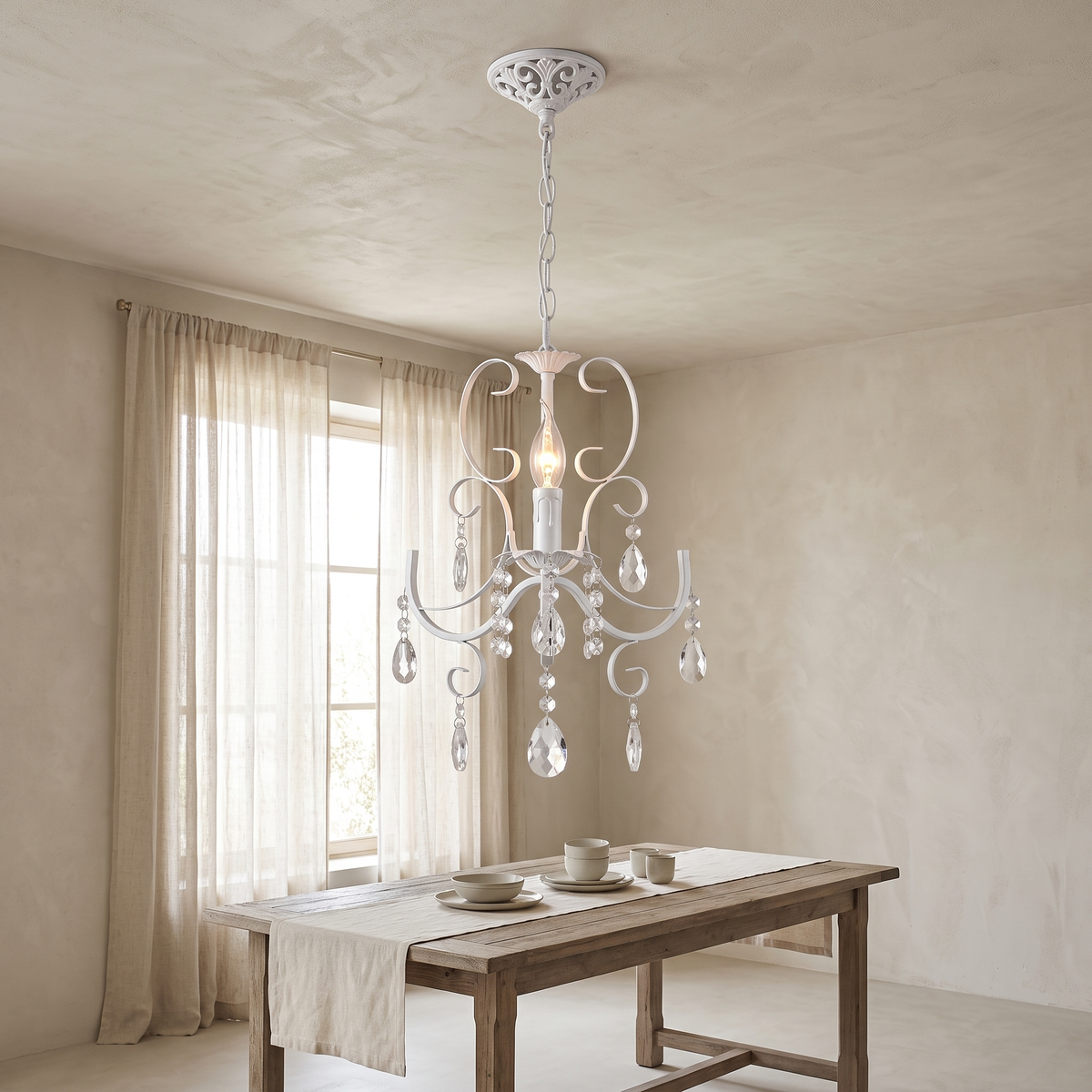 Angeline crystal chandelier above a dining table