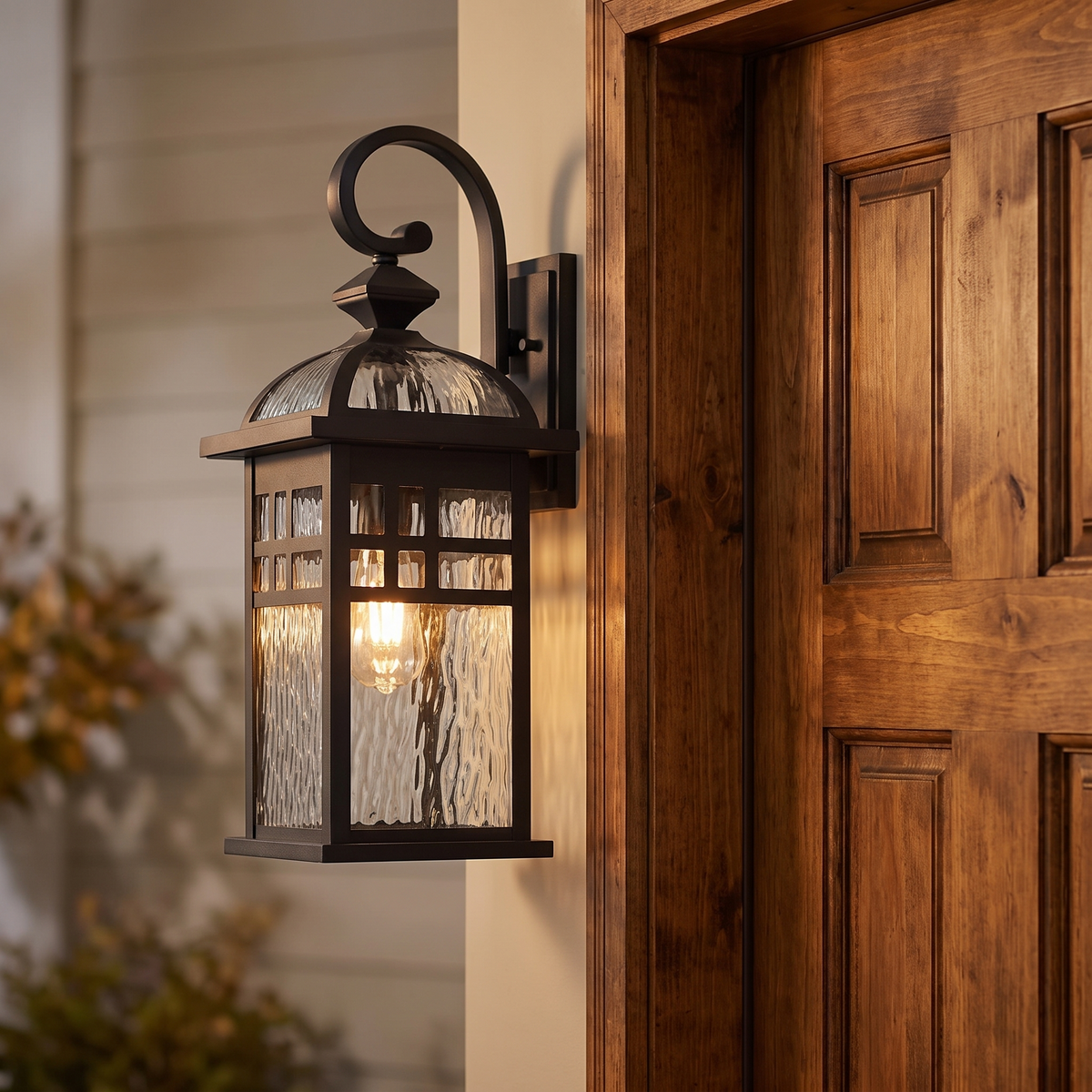 Bayonne outdoor lantern beside a wooden entry door