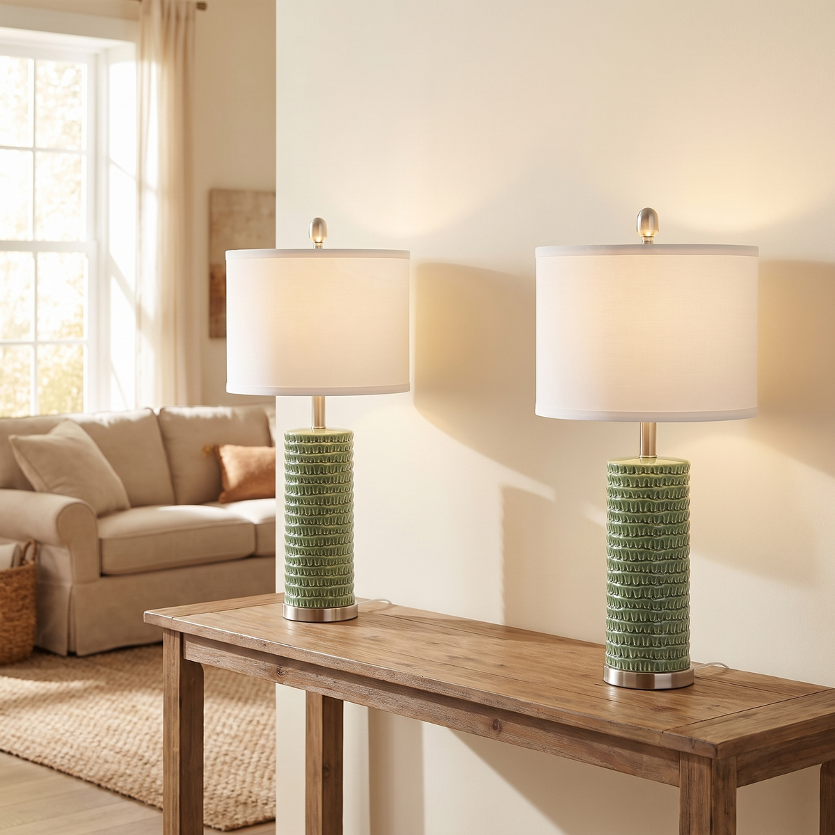 Chamonix green ceramic lamps on a console