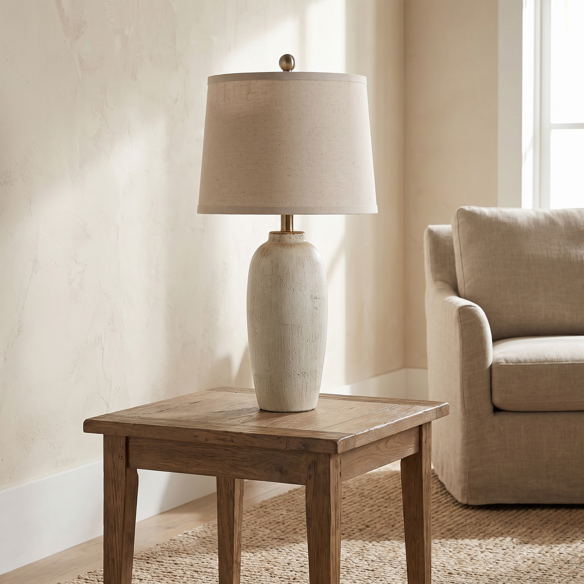Chinon jar lamp on a side table
